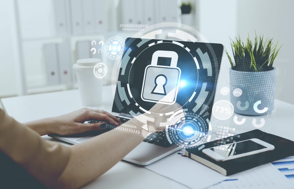 Businesswoman typing in her office. A digital security HUD sketch. Concept of hi tech in business Toned image double exposure mock up Elements of this image furnished by NASA